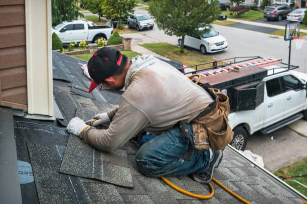 Professional Flat Roof Repair technician working in Granby, MA